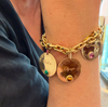 Angelo pendant, yellow gold, colored gemstone cabochon